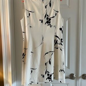 Elegant Black and White lined Sleeveless Dress